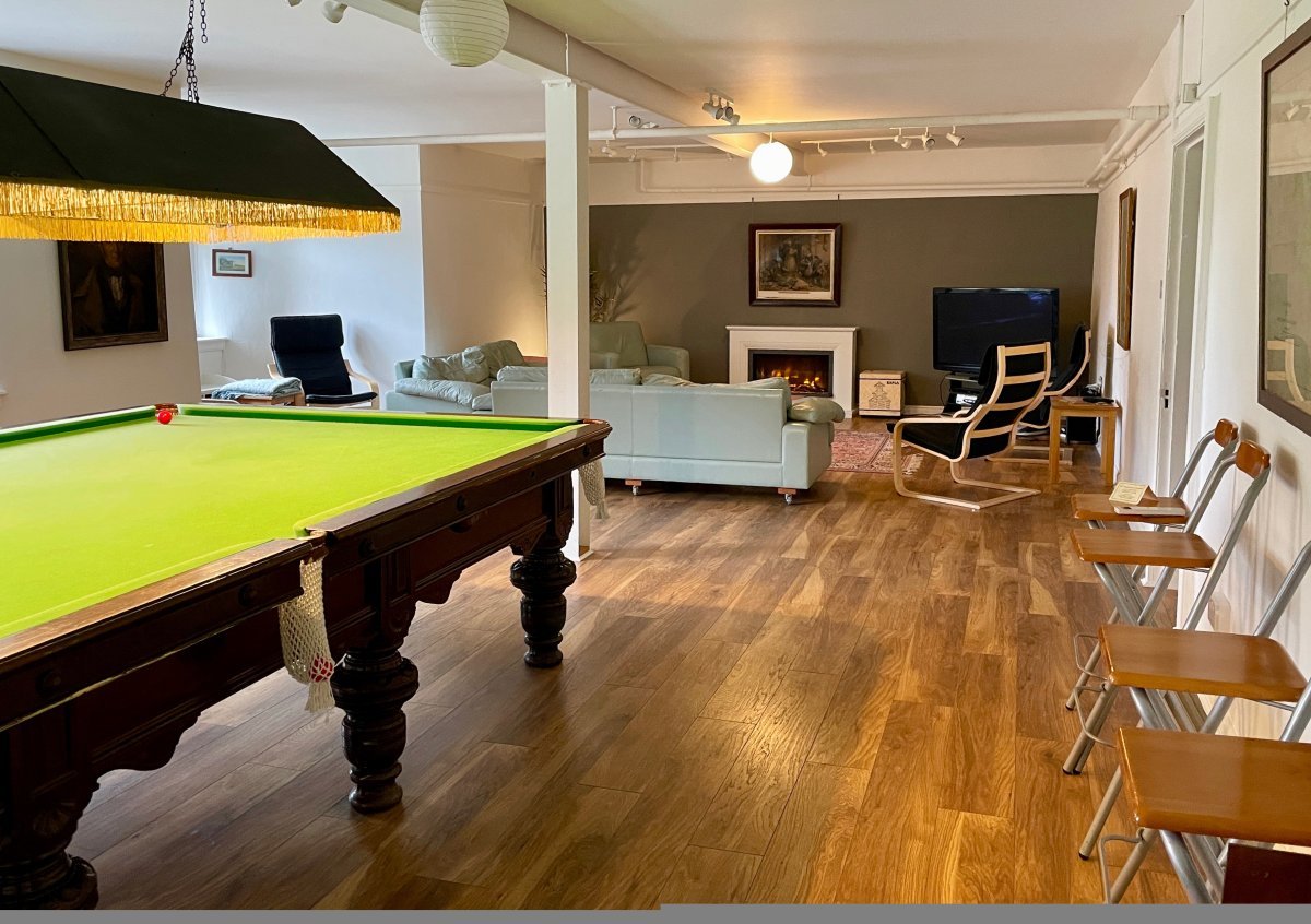 Snooker room with cosy seating area and Sky TV